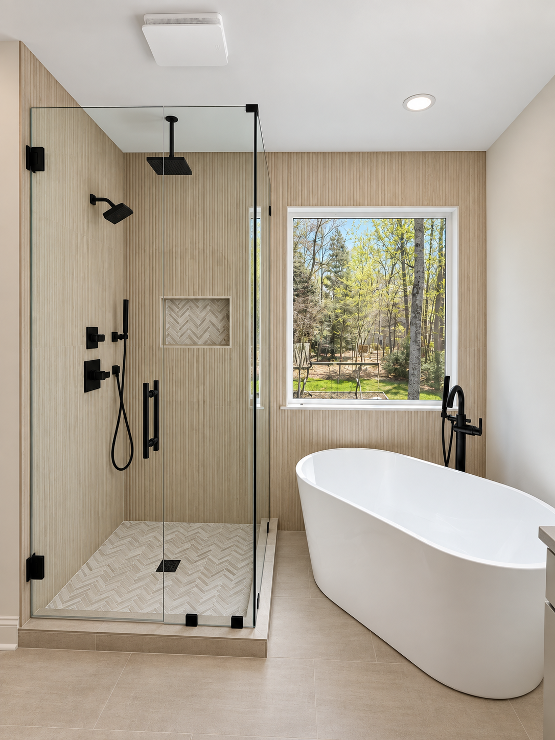 modern bathroom with freestanding tub and shower built by Gold C Builders in Denver NC