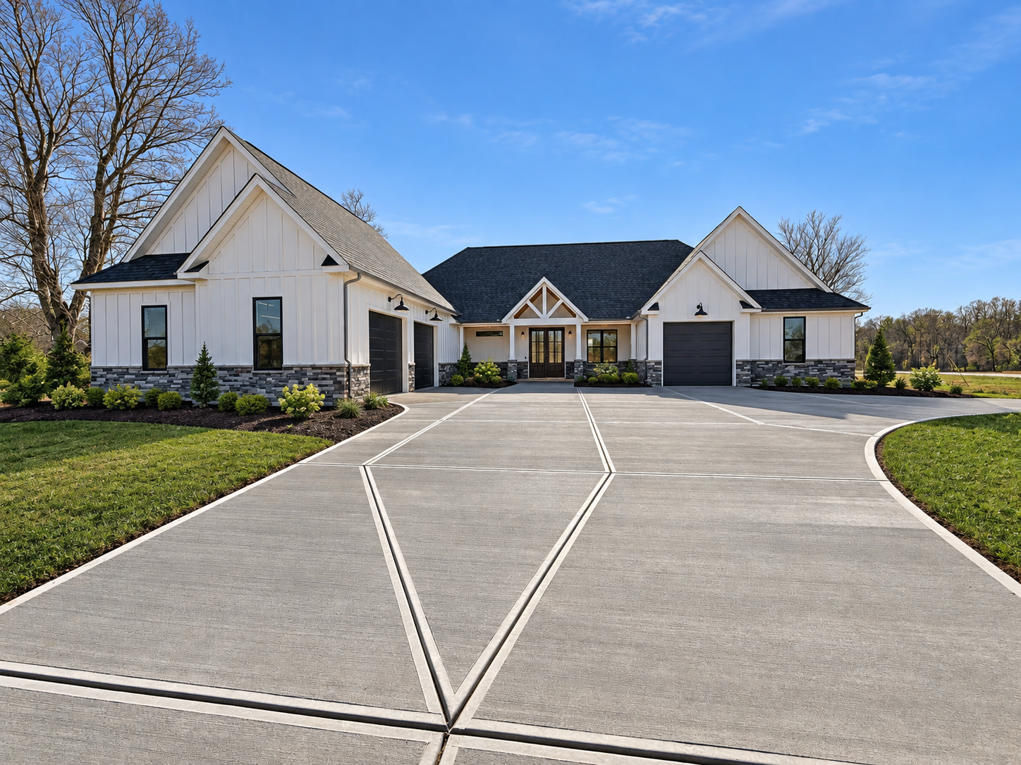 modern farmhouse exterior with curved driveway built by Gold C Builders in Denver NC